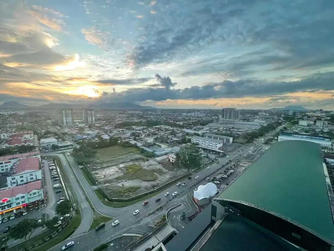 Aerial view of the site and the surrounding 4th Mile corridor at dusk